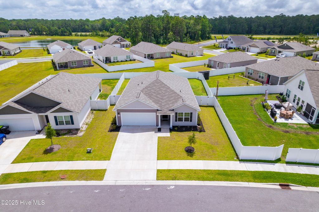 Photo of 4755 Cockatoo Drive NW, Shallotte, NC 28470 (MLS # 100518104)