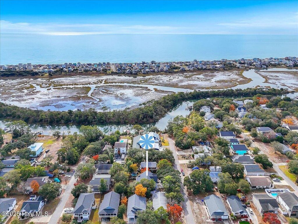 Photo of 102 SW 11th Street, Oak Island, NC 28465 (MLS # 100543778)