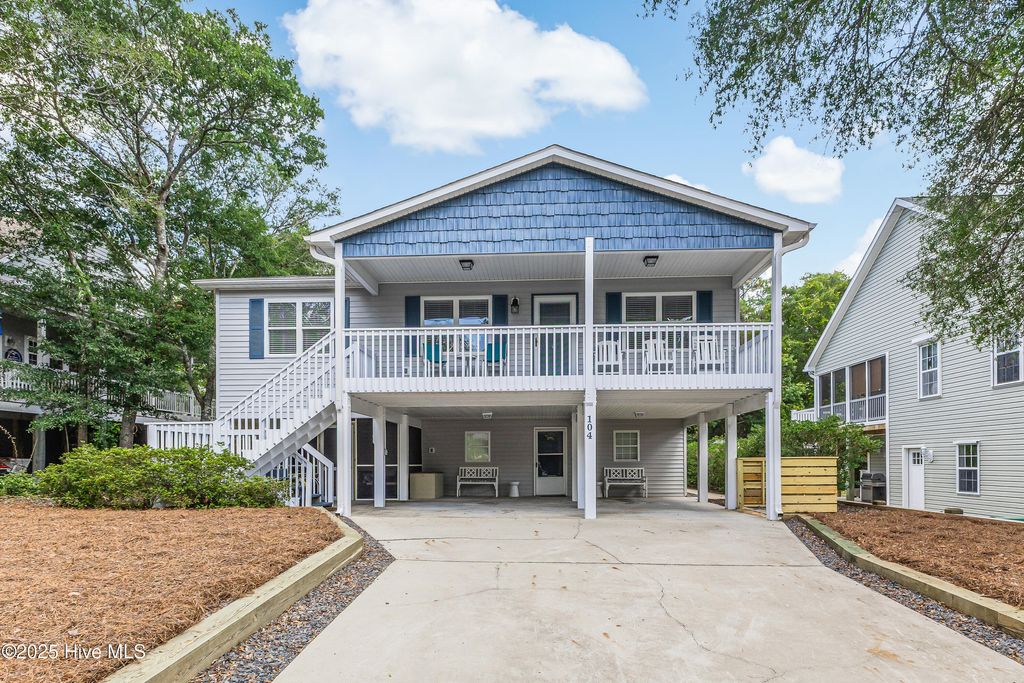 Photo of 104 SE 13th Street, Oak Island, NC 28465 (MLS # 100534126)