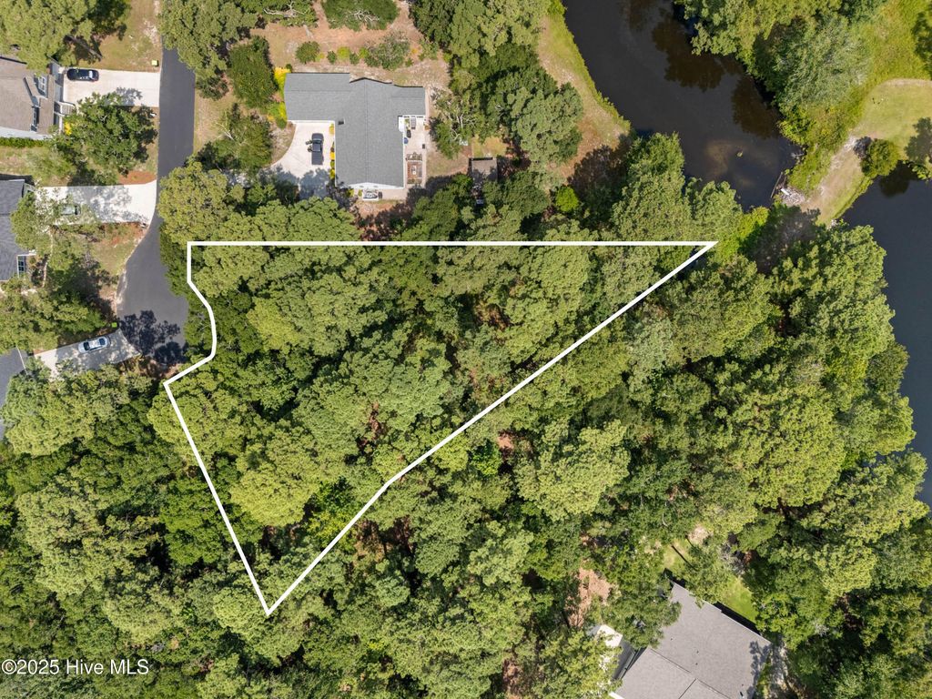 Photo of 778 Lakeside Drive SE, Bolivia, NC 28422 (MLS # 100523897)