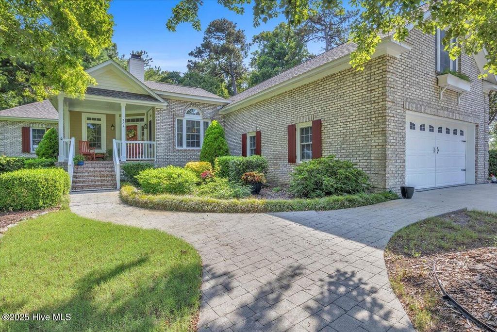 Photo of 301 Wisteria Way, Caswell Beach, NC 28465 (MLS # 100517713)