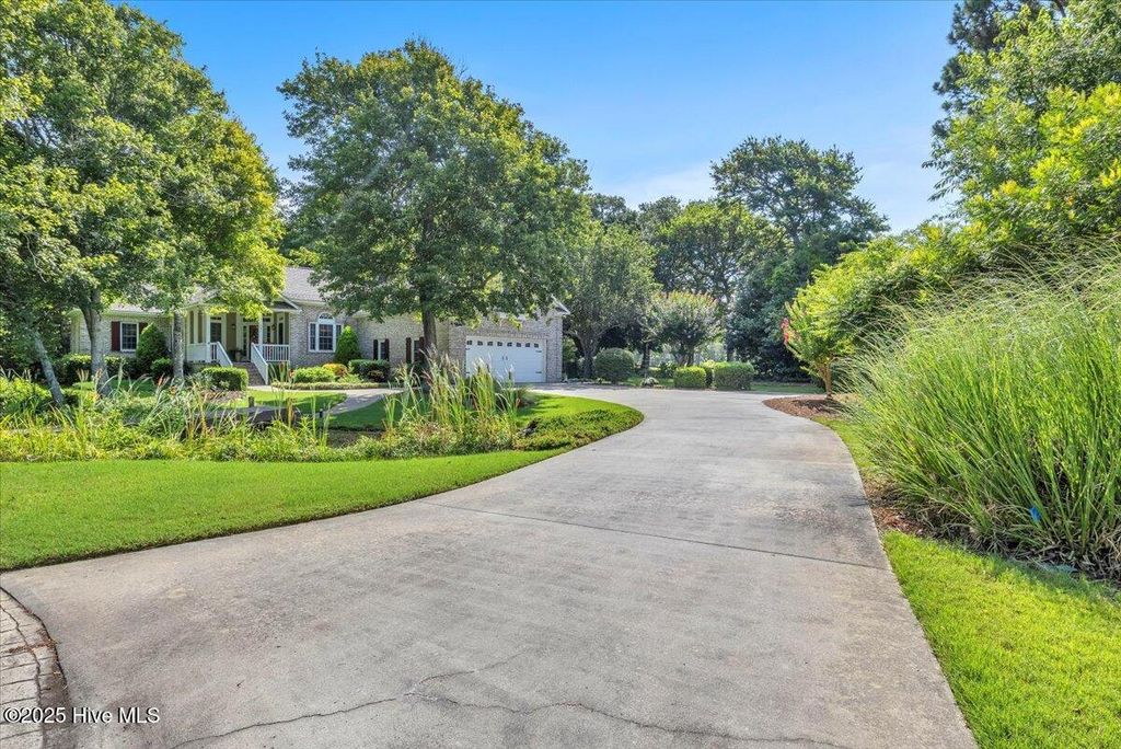 Photo of 301 Wisteria Way, Caswell Beach, NC 28465 (MLS # 100517713)