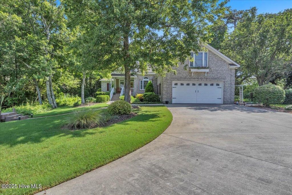 Photo of 301 Wisteria Way, Caswell Beach, NC 28465 (MLS # 100517713)