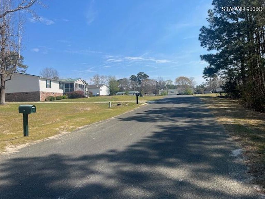 Photo of 1864 Sunset Cove Drive SE, Bolivia, NC 28422 (MLS # 100499315)