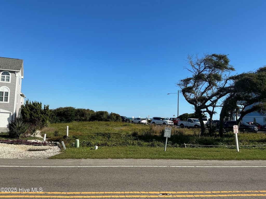 Photo of 402 Fort Fisher Boulevard N, Kure Beach, NC 28449 (MLS # 100537141)