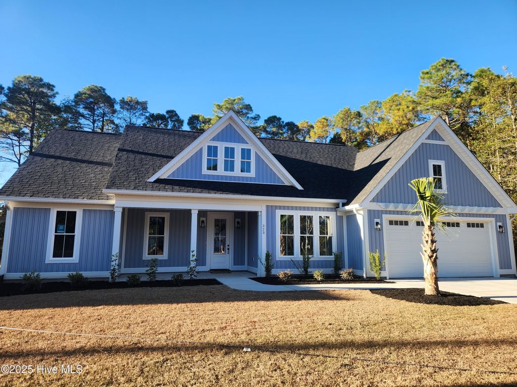 Photo of 323 Pineknoll Drive NW, Calabash, NC 28467 (MLS # 100541879)