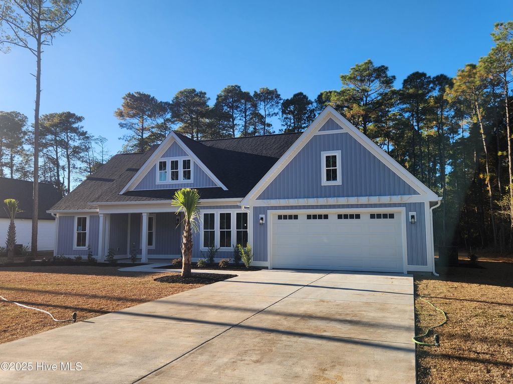 Photo of 323 Pineknoll Drive NW, Calabash, NC 28467 (MLS # 100541879)