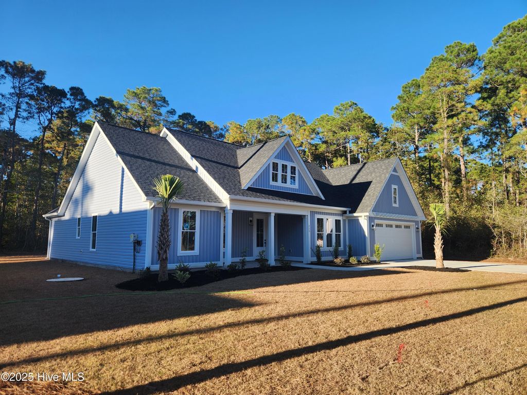 Photo of 323 Pineknoll Drive NW, Calabash, NC 28467 (MLS # 100541879)