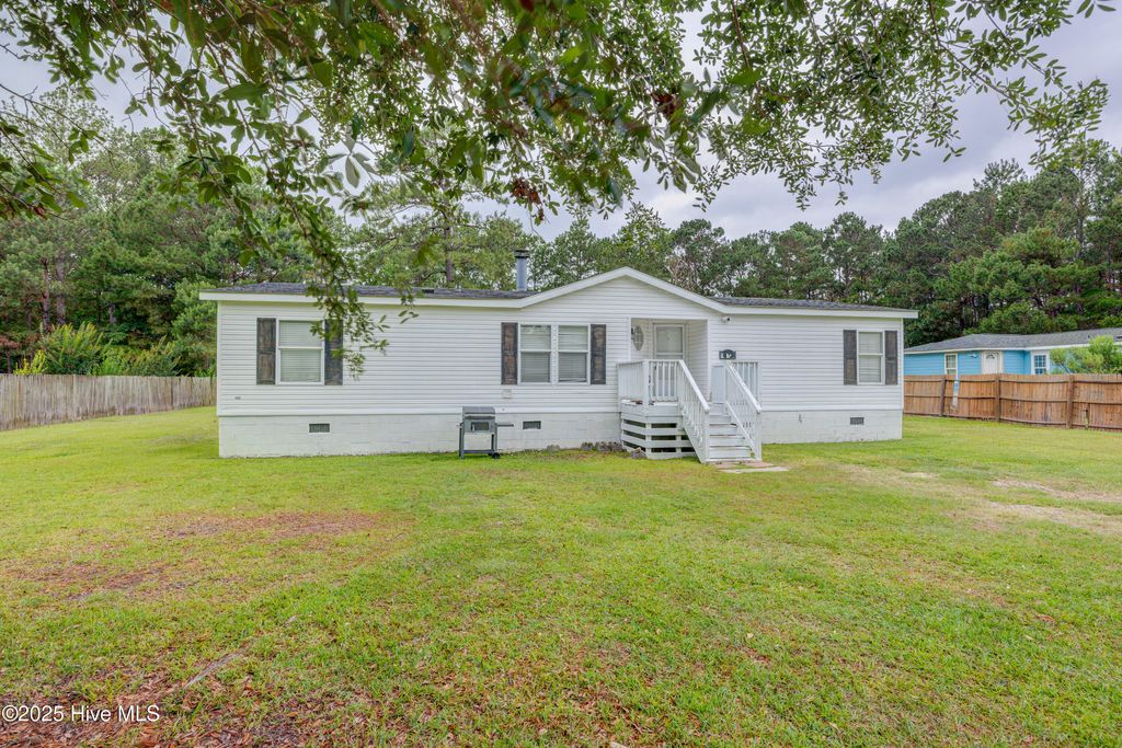Photo of 9177 Hawk&#39;S Nest Drive NE, Leland, NC 28451 (MLS # 100510200)