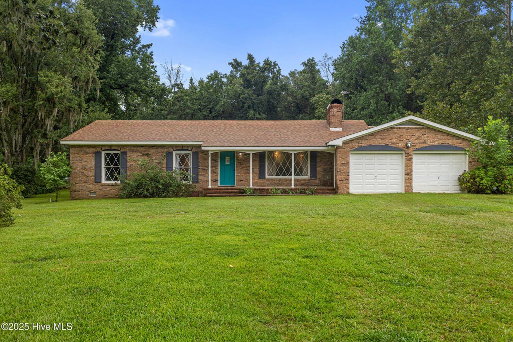 Photo of 1398 Old Mill Creek Road SE, Winnabow, NC 28479 (MLS # 100524507)