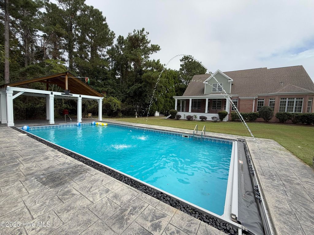 Photo of 203 Hatteras Court, Hampstead, NC 28443 (MLS # 100536137)