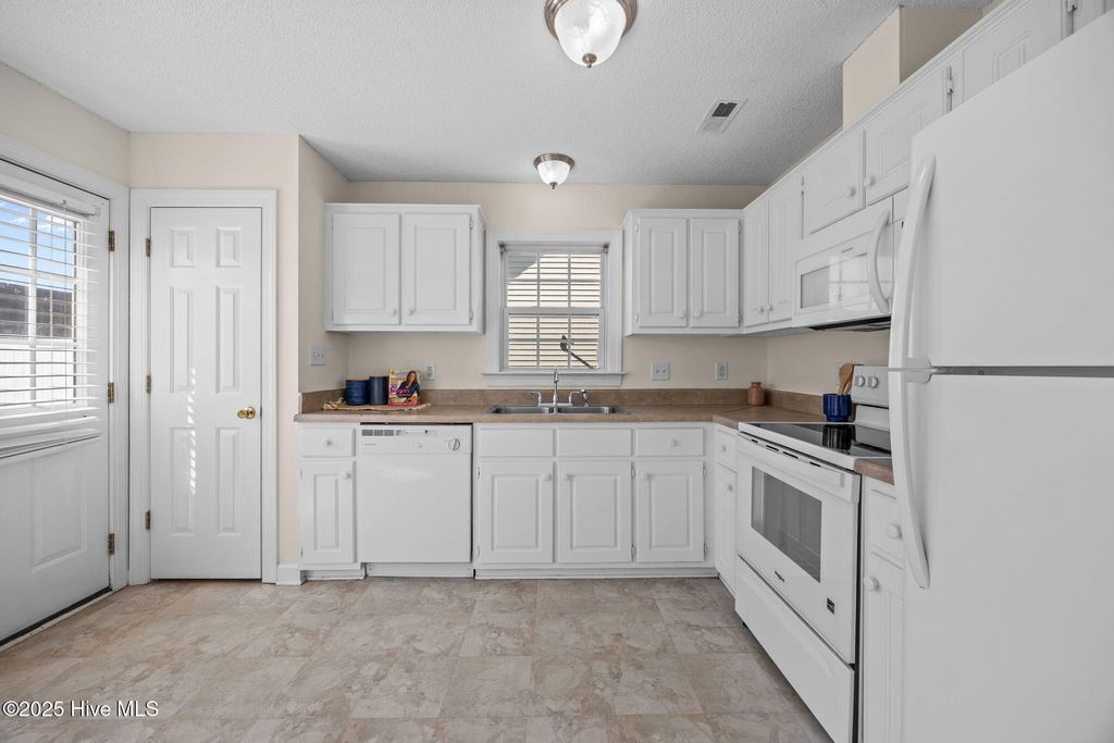 Photo of 1008 Penncross Drive, Greenville, NC 27834 (MLS # 100532042)