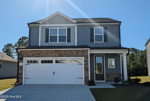 Photo of 38 Umbrella Palm Drive, Hampstead, NC 28443 (MLS # 100538497) Photo of 38 Umbrella Palm Drive, Hampstead, NC 28443 (MLS # 100538497)