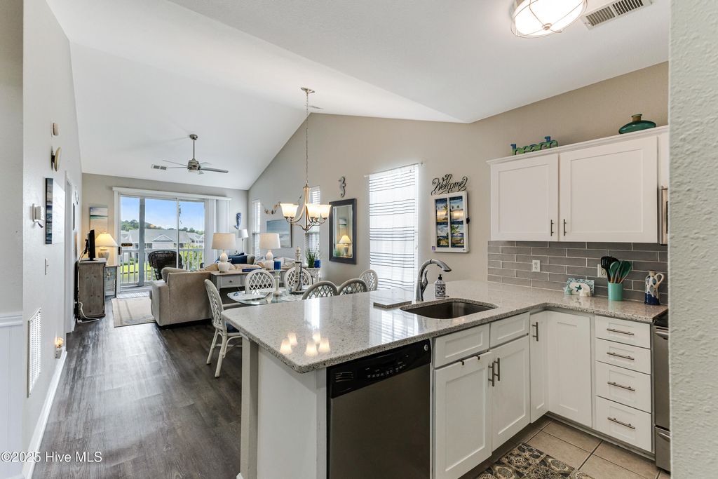 Photo of 881 Great Egret Circle #F, Sunset Beach, NC 28468 (MLS # 100513251)
