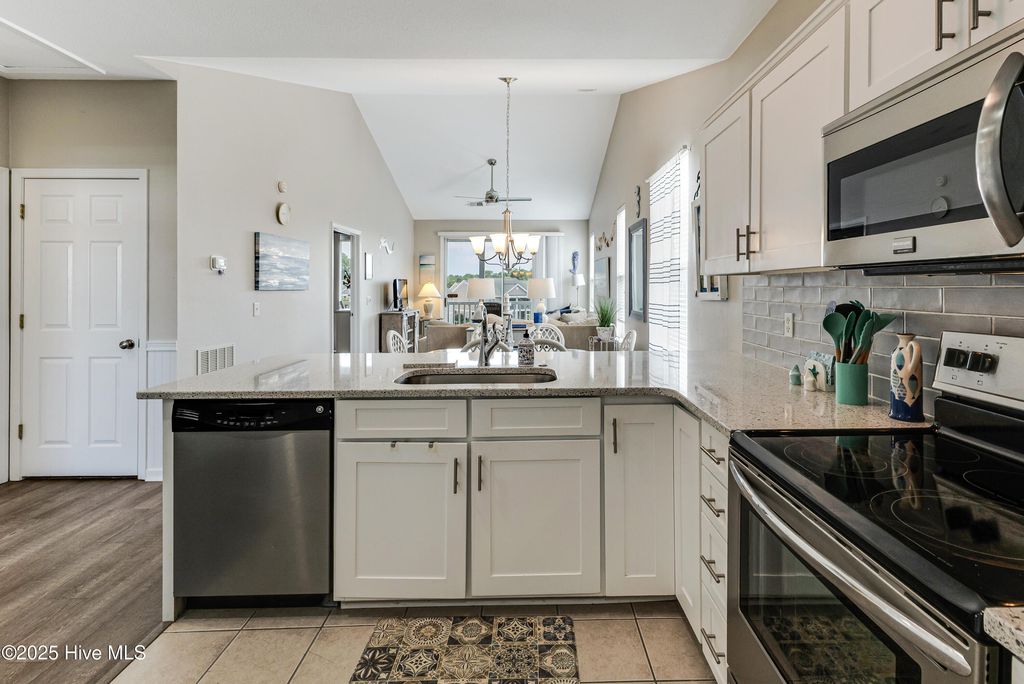Photo of 881 Great Egret Circle #F, Sunset Beach, NC 28468 (MLS # 100513251)