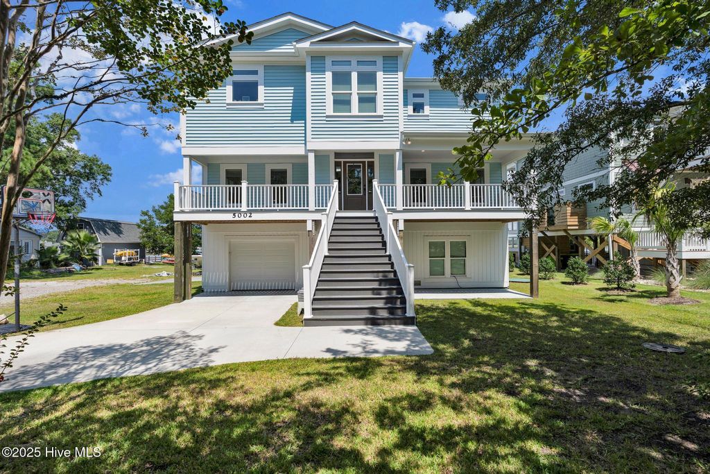 Photo of 5002 E Yacht Drive, Oak Island, NC 28465 (MLS # 100527930)