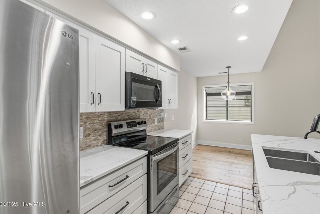 Photo of 212 Kings Trail # A, Sunset Beach, NC 28468 (MLS # 100544221)