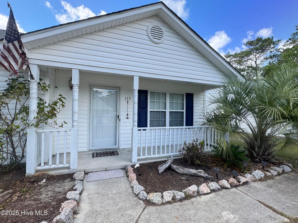 Photo of 117 NW 10th Street, Oak Island, NC 28465 (MLS # 100534845)
