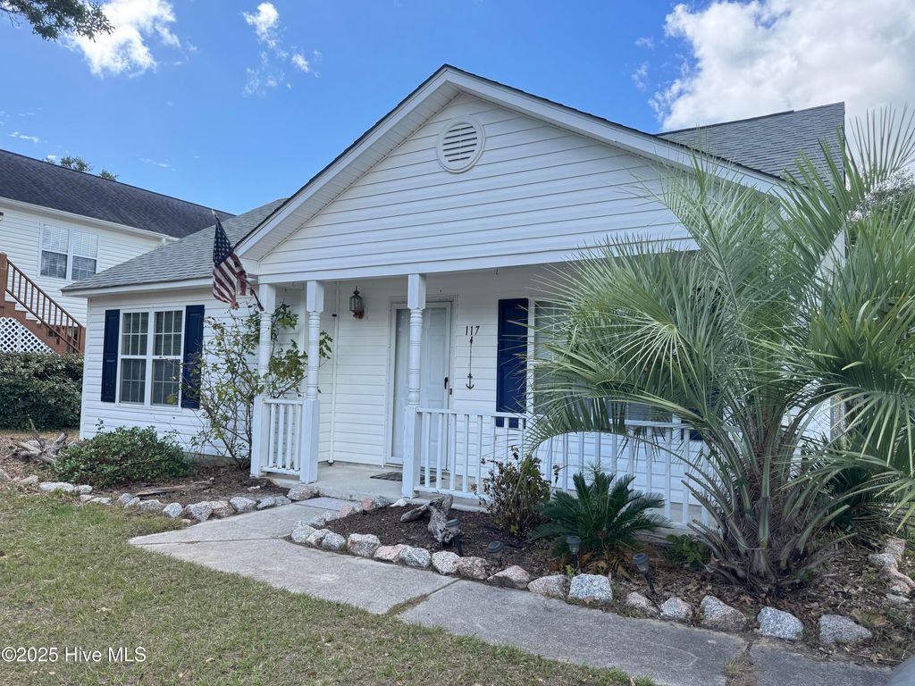Photo of 117 NW 10th Street, Oak Island, NC 28465 (MLS # 100534845)