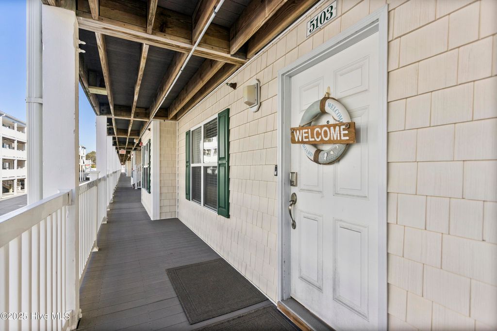 Photo of 105 SE 58th Street #5103, Oak Island, NC 28465 (MLS # 100531456)