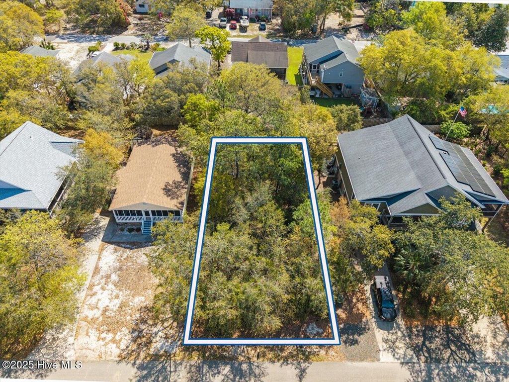 Photo of 148 NE 2nd Street, Oak Island, NC 28465 (MLS # 100489301)