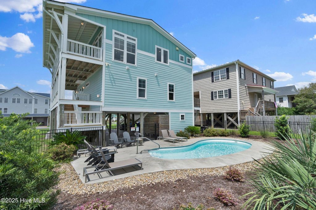Photo of 202 Sherrill Street, Oak Island, NC 28465 (MLS # 100525433)