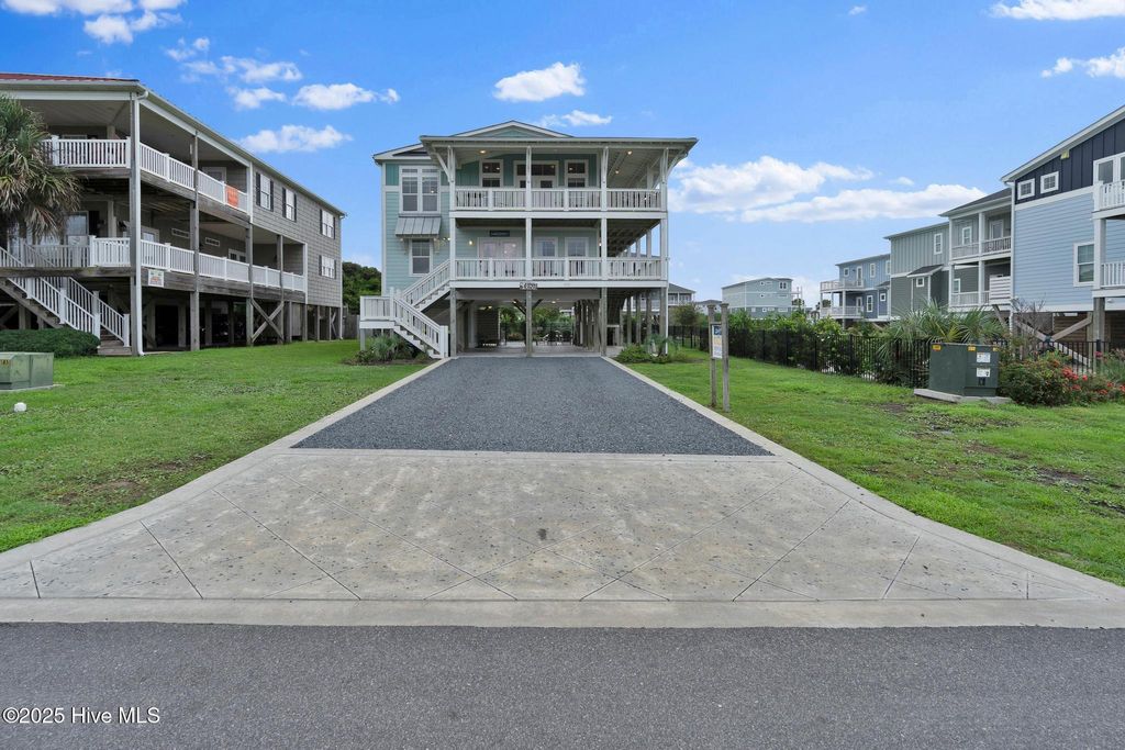 Photo of 202 Sherrill Street, Oak Island, NC 28465 (MLS # 100525433)