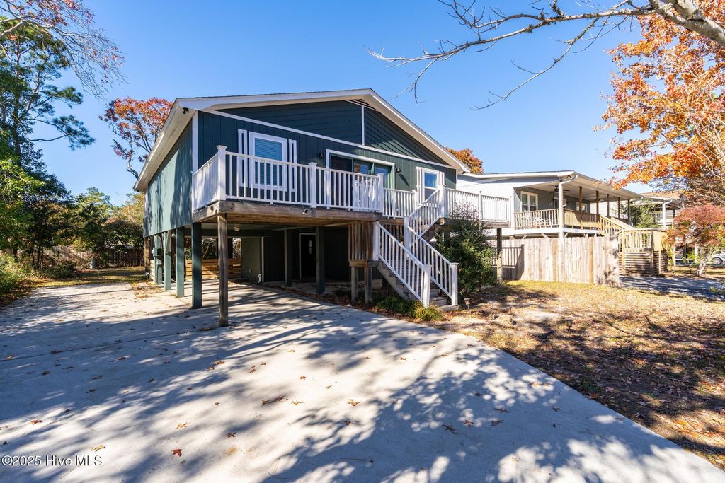 Photo of 137 NE 6th Street, Oak Island, NC 28465 (MLS # 100542173)