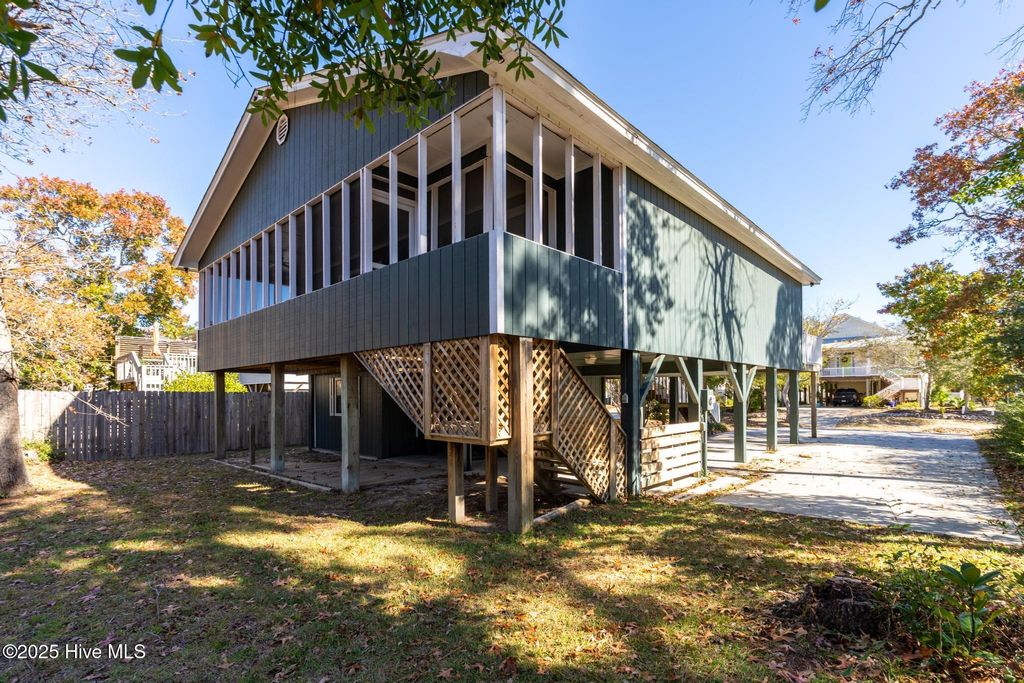 Photo of 137 NE 6th Street, Oak Island, NC 28465 (MLS # 100542173)