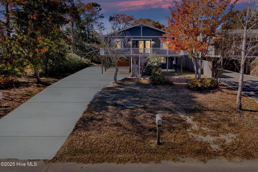 Photo of 137 NE 6th Street, Oak Island, NC 28465 (MLS # 100542173)