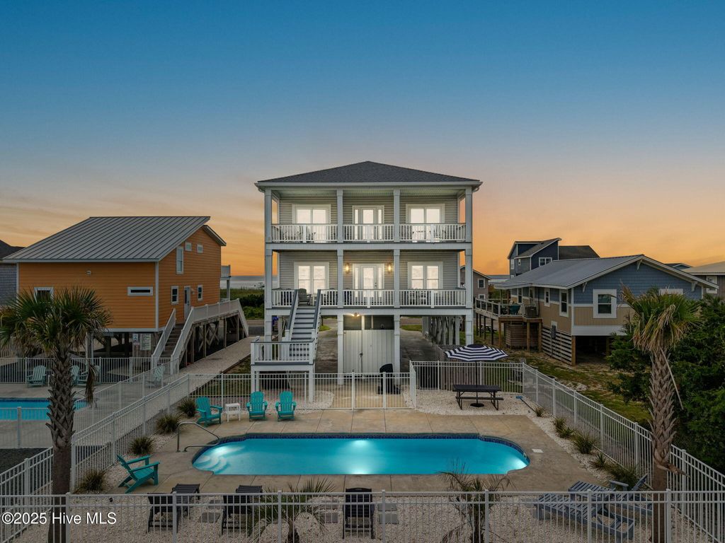 Photo of 1012 W Beach Drive, Oak Island, NC 28465 (MLS # 100528214)