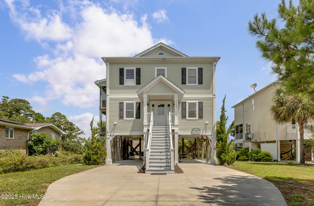 Photo of 5106 E Yacht Drive, Oak Island, NC 28465 (MLS # 100522318)