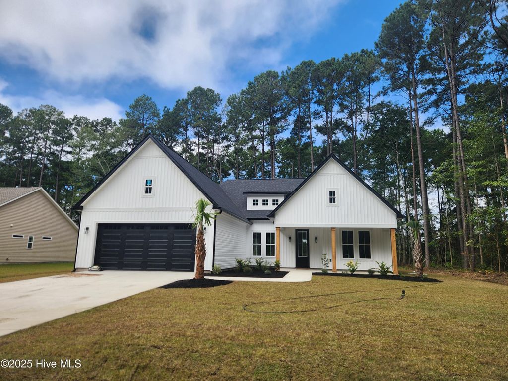 Photo of 813 Boundaryline Drive NW, Calabash, NC 28467 (MLS # 100529896)