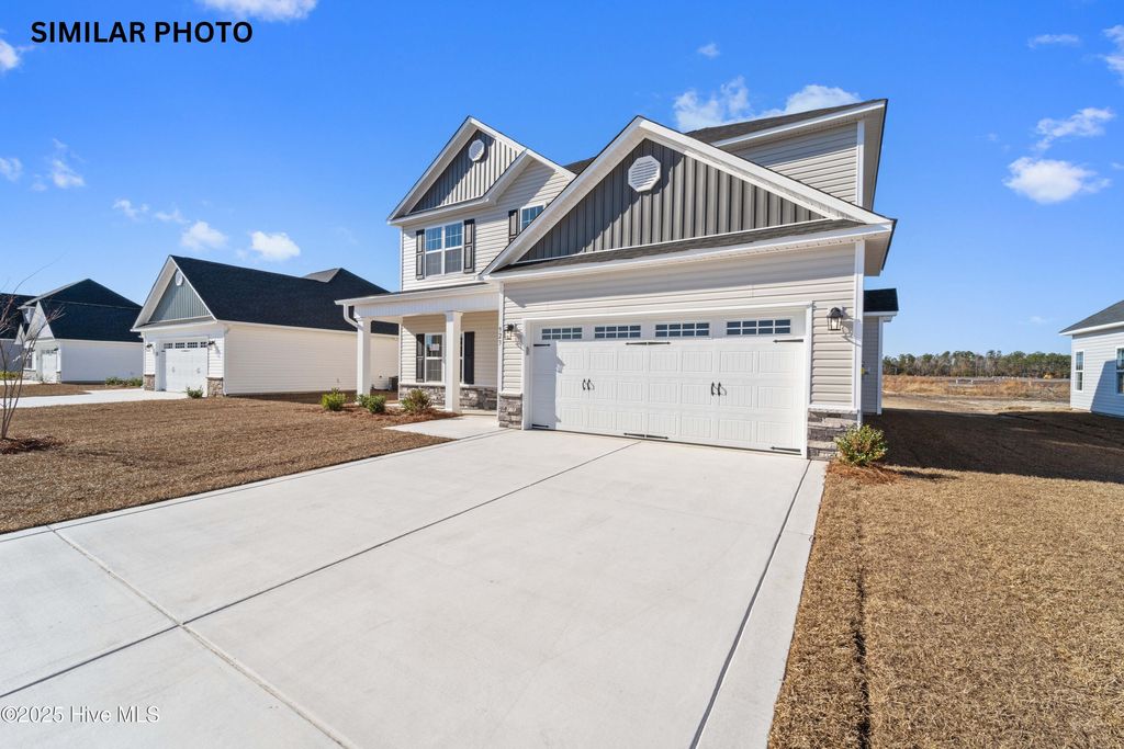 Photo of 1822 Olde Towne Pointe Boulevard, Jacksonville, NC 28546 (MLS # 100519692)