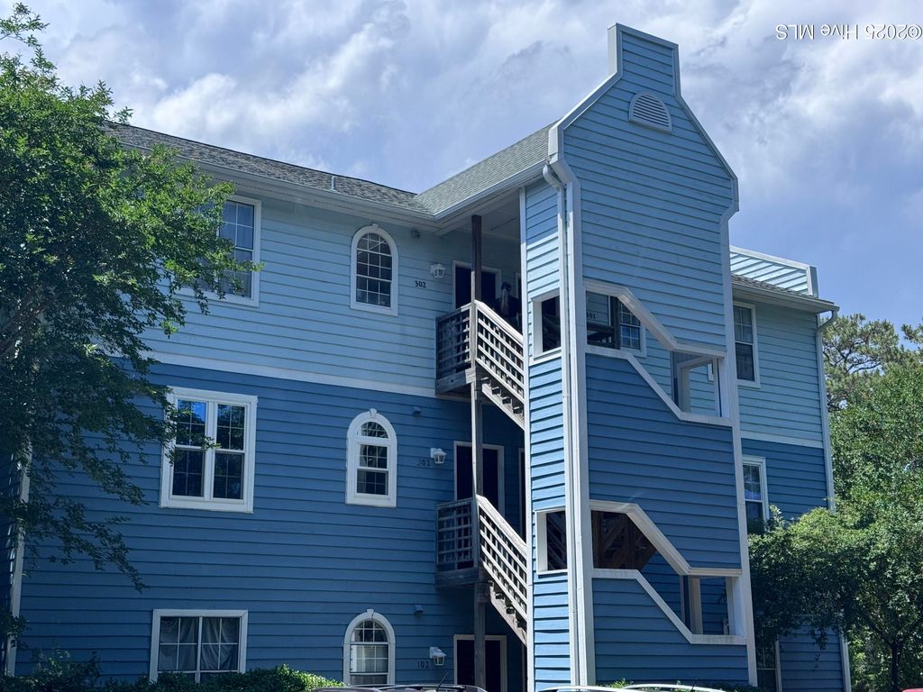 Photo of 4240 Wilshire Boulevard #Apt 101, Wilmington, NC 28403 (MLS # 100507366)