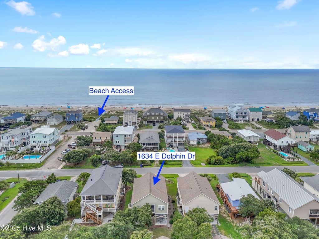 Photo of 1634 E Dolphin Drive, Oak Island, NC 28465 (MLS # 100526399)