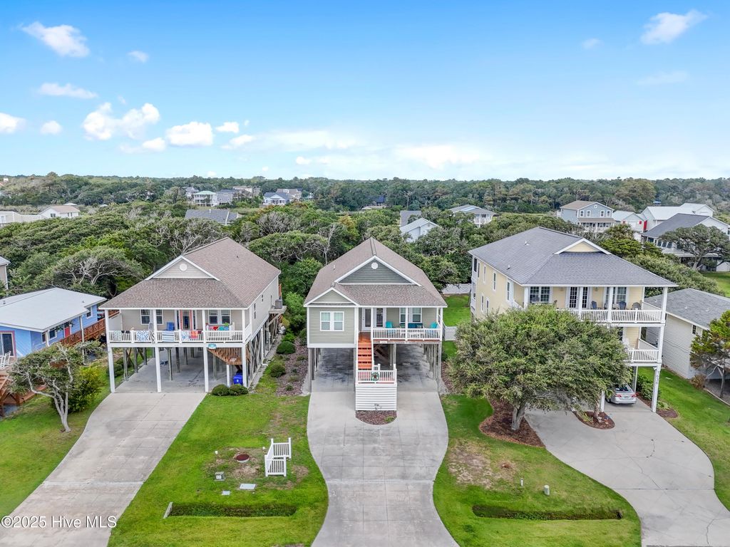 Photo of 1634 E Dolphin Drive, Oak Island, NC 28465 (MLS # 100526399)
