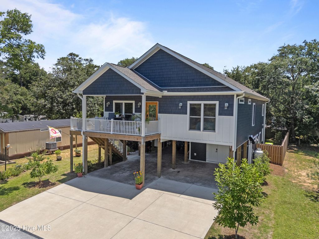 Photo of 7605 E Yacht Drive NE, Oak Island, NC 28465 (MLS # 100512524)