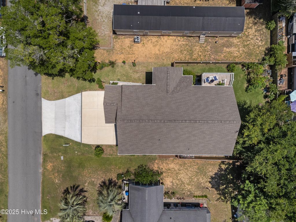 Photo of 7605 E Yacht Drive NE, Oak Island, NC 28465 (MLS # 100512524)