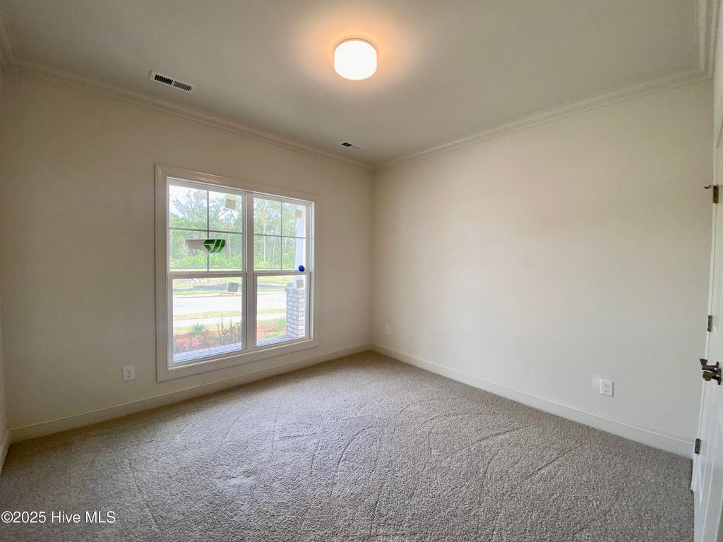 Photo of 3377 Island Lakes Drive, Oak Island, NC 28461 (MLS # 100485850)