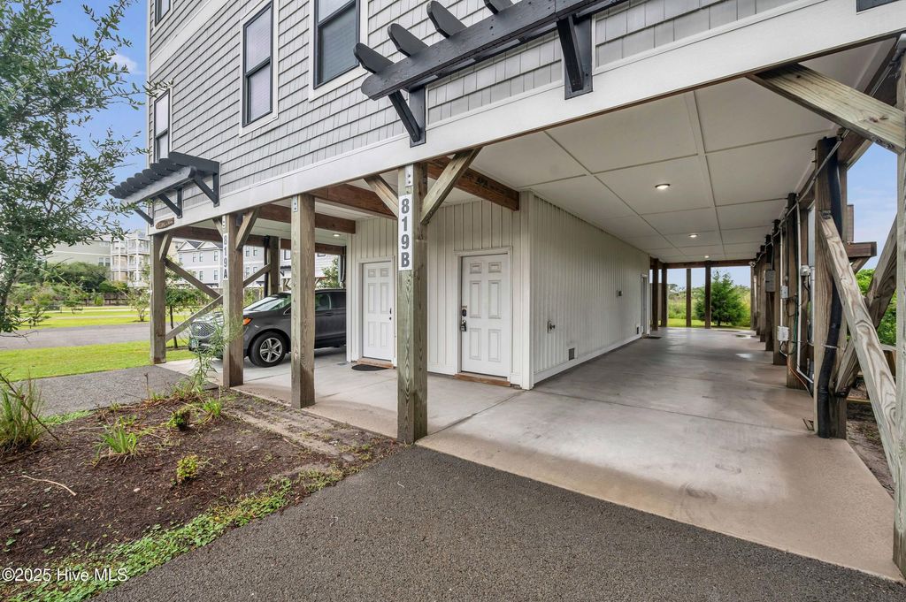 Photo of 819 New River Drive #B, Surf City, NC 28445 (MLS # 100524088)