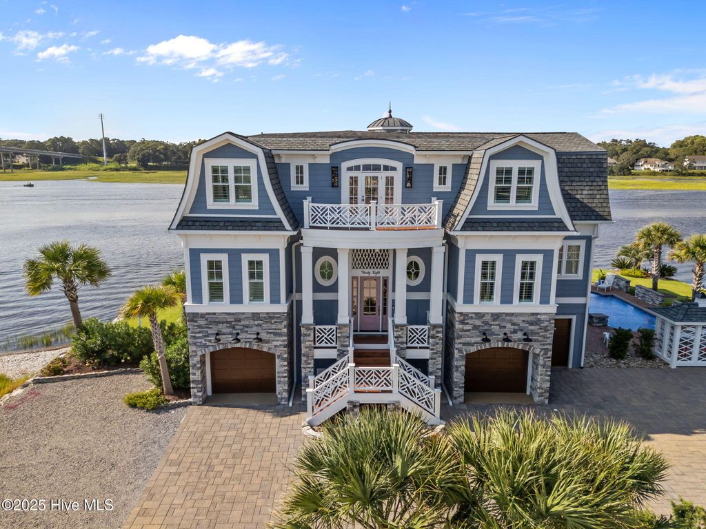 Photo of 98 Laurinburg Street, Ocean Isle Beach, NC 28469 (MLS # 100526938)