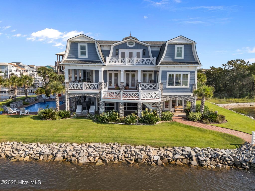Photo of 98 Laurinburg Street, Ocean Isle Beach, NC 28469 (MLS # 100526938)