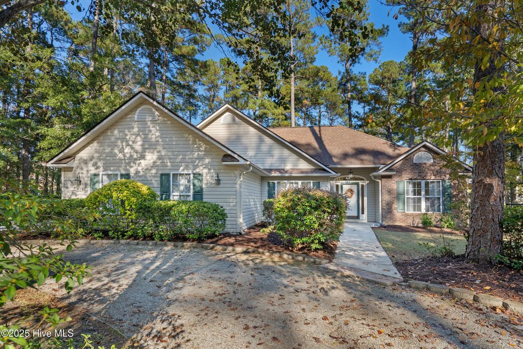 Photo of 41 Pinewood Drive, Carolina Shores, NC 28467 (MLS # 100540367)