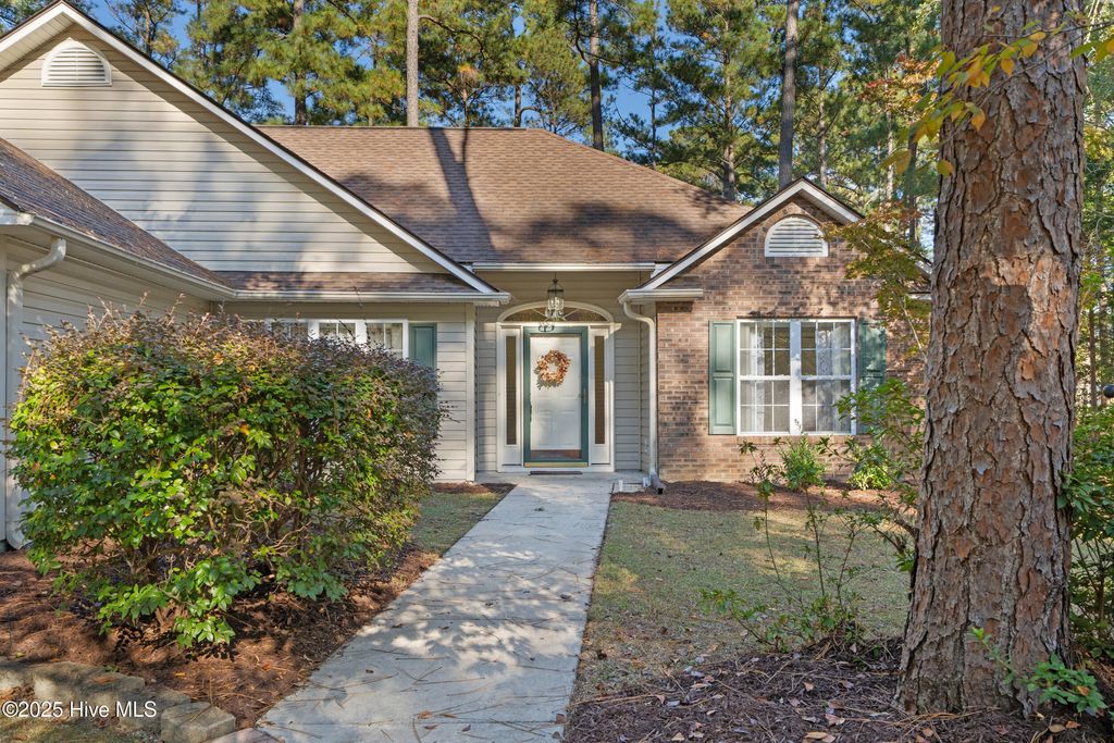 Photo of 41 Pinewood Drive, Carolina Shores, NC 28467 (MLS # 100540367)