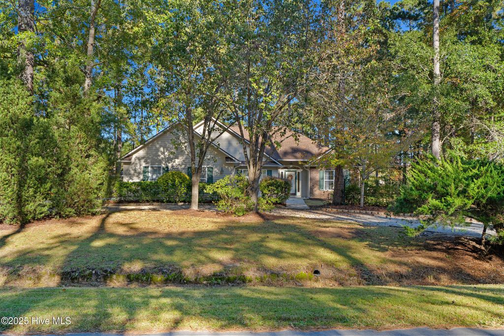 Photo of 41 Pinewood Drive, Carolina Shores, NC 28467 (MLS # 100540367)