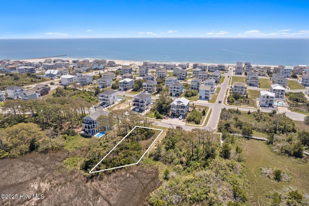 Photo of 421 E Sixth Street, Ocean Isle Beach, NC 28469 (MLS # 100516404)