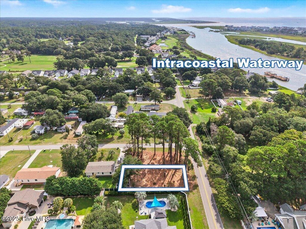 Photo of 1819 Goose Creek Road SW, Ocean Isle Beach, NC 28469 (MLS # 100525392)