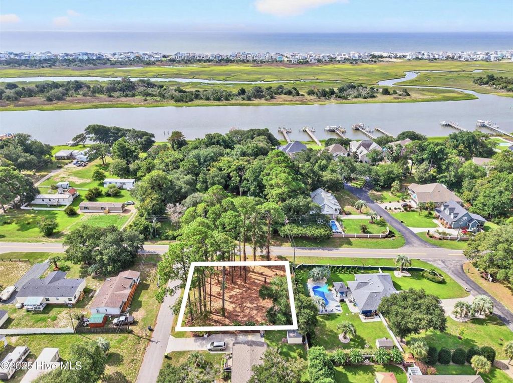 Photo of 1819 Goose Creek Road SW, Ocean Isle Beach, NC 28469 (MLS # 100525392)