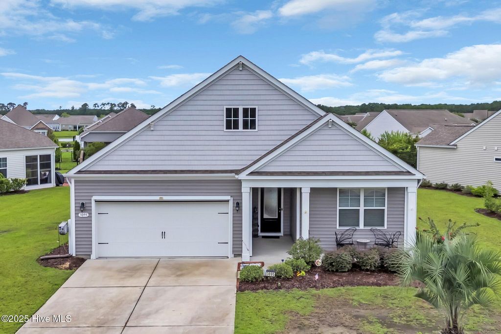 Photo of 3095 Crescent Lake Drive, Carolina Shores, NC 28467 (MLS # 100524676)